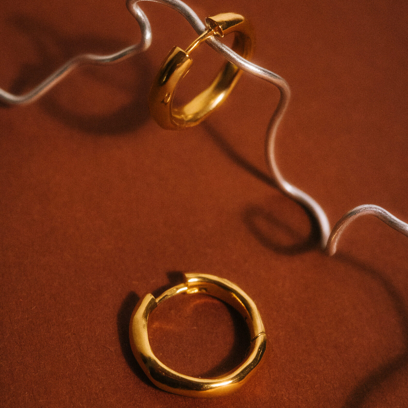 EKATERINA TOLSTAYA Моносерьга Тепло позолота