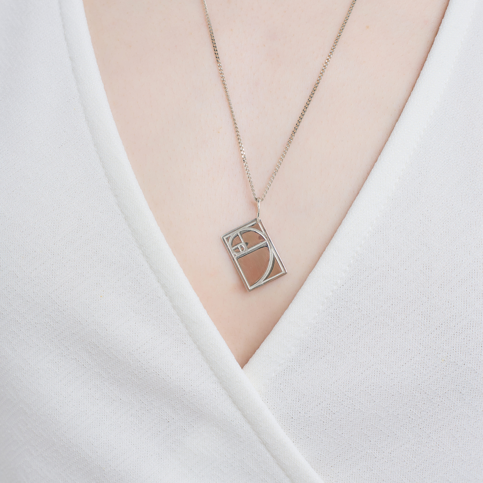 INFANTA Подвеска Золотое сечение серебро